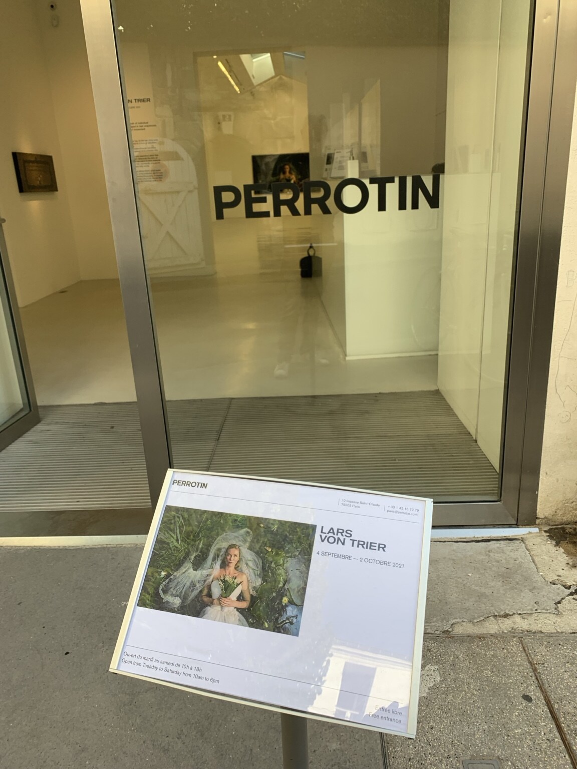 The Perrotin entrance and Lars von Trier exhibition sign